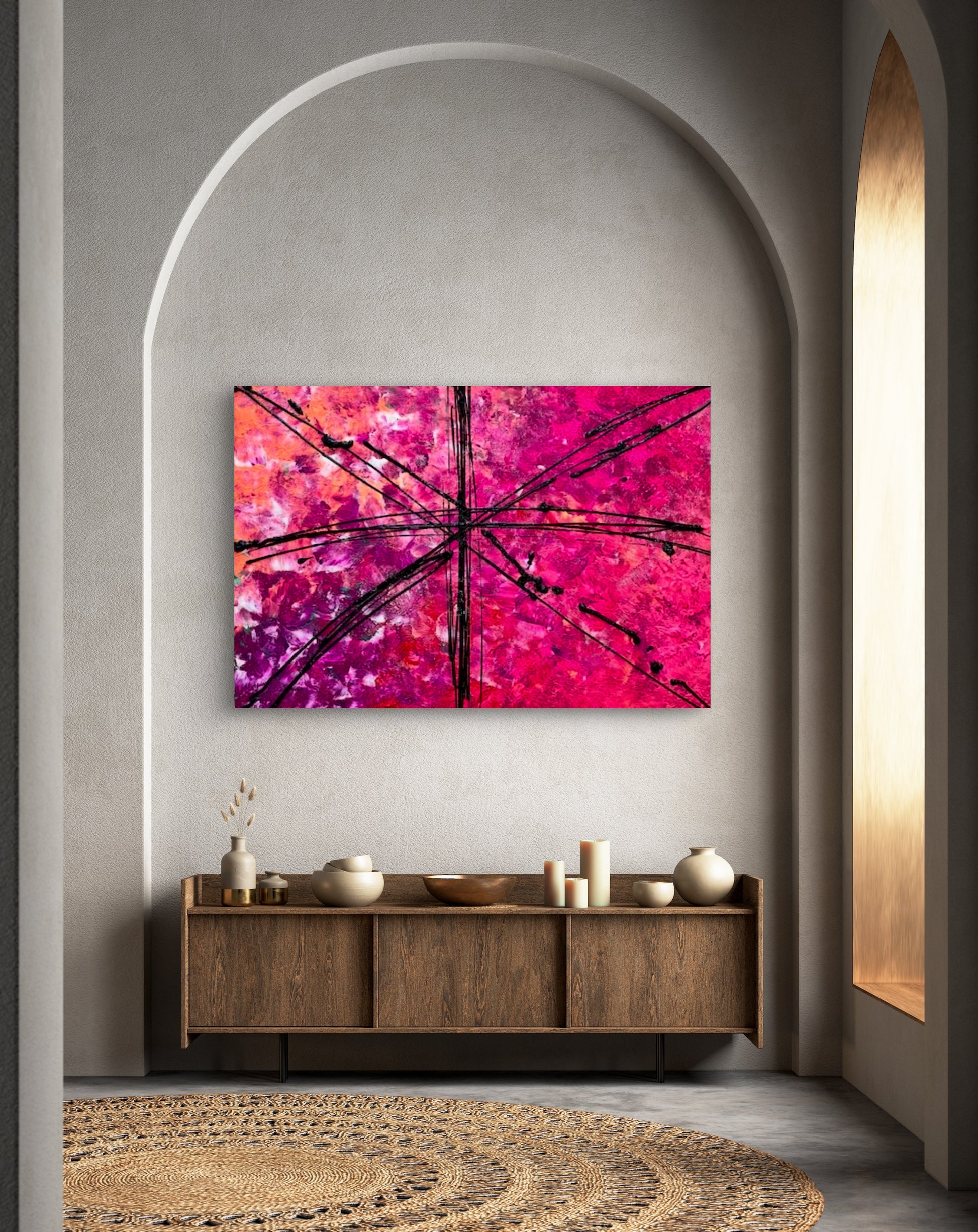 Pink abstract Union Jack painting in home above a brown cabinet 