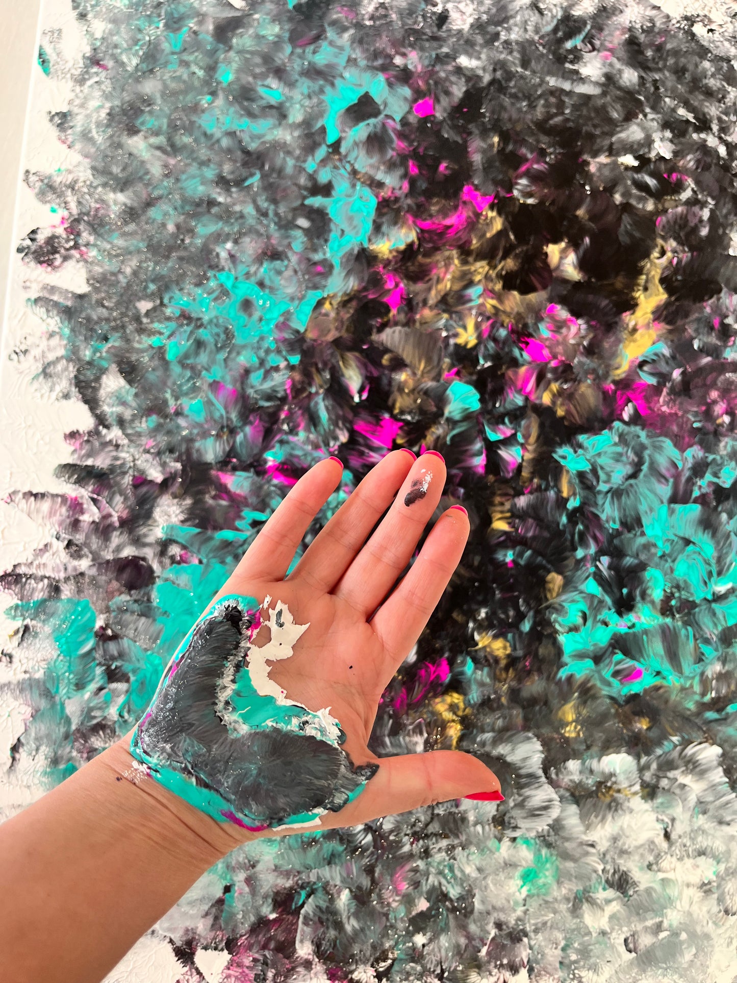 Abstract painting with swirling black, pink, and green hues depicting moth-like shapes fluttering toward a central glowing orb, resembling moths drawn to a mothball, creating a mysterious and captivating atmosphere.